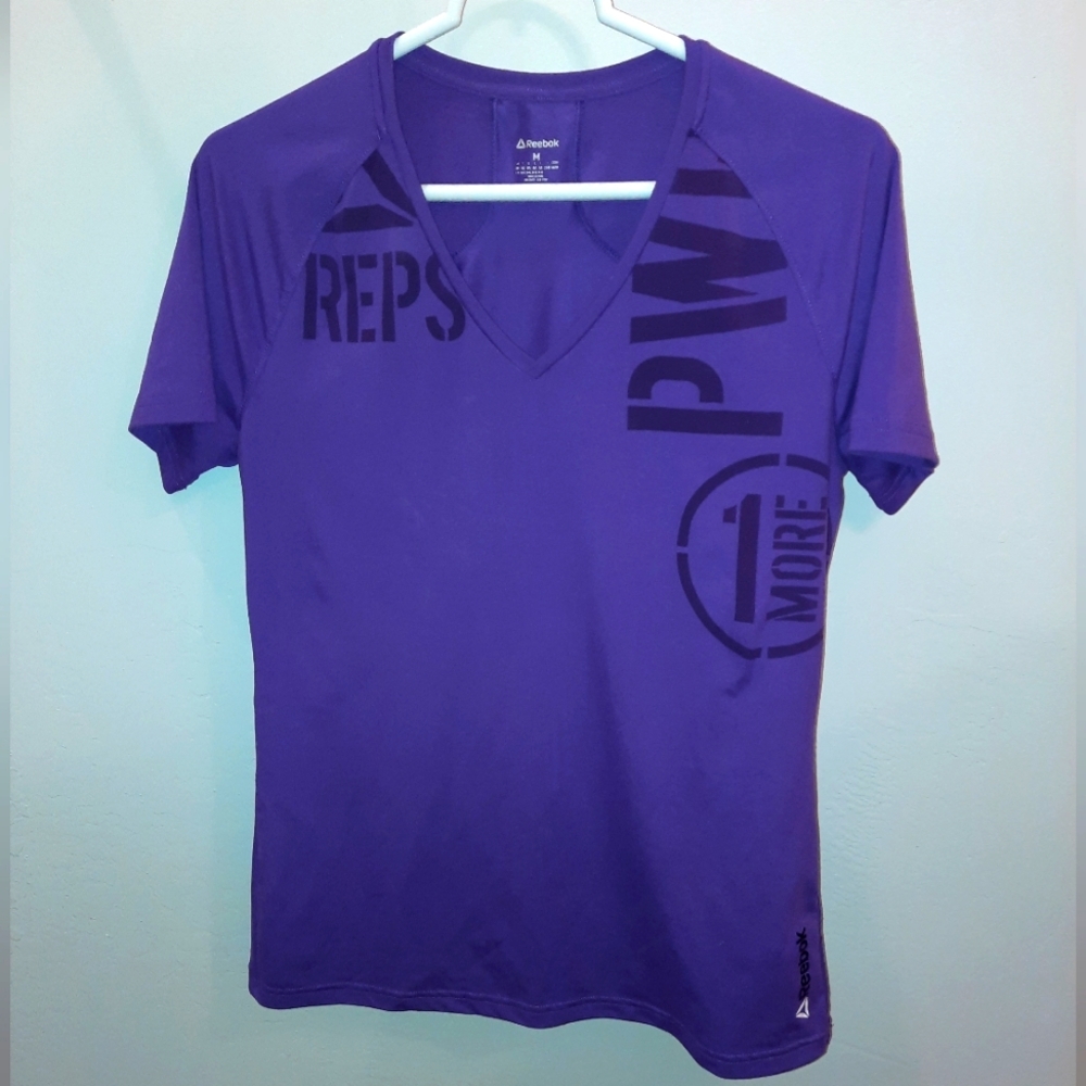 Reebok Women's Size medium Bright Purple short sleeve V Neck Shirt EUC